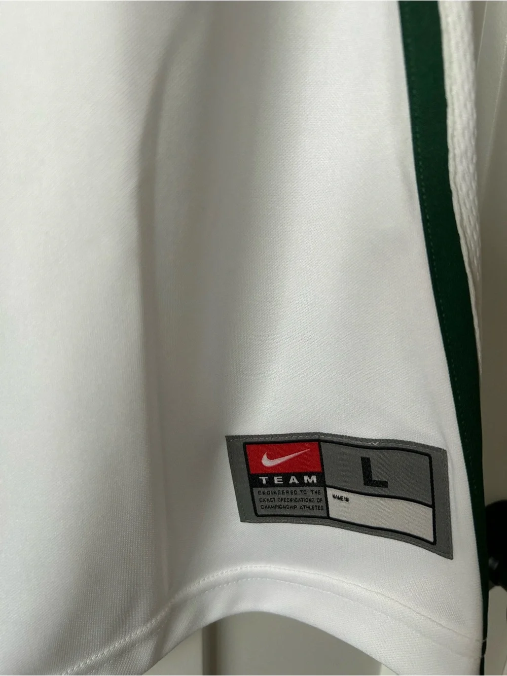 Nike White V-Neck Basketball Jersey with Green Trim